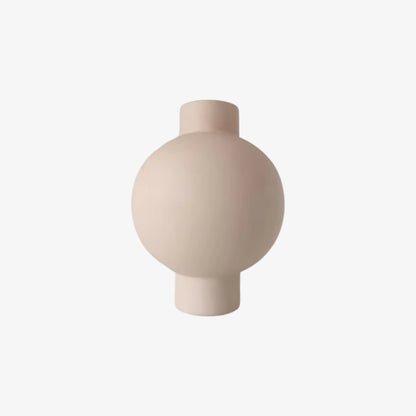 Beige designed vase​ on a white background