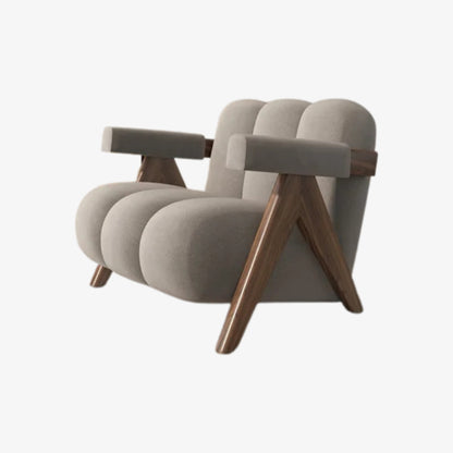 Grey armchair with wooden legs on a white background