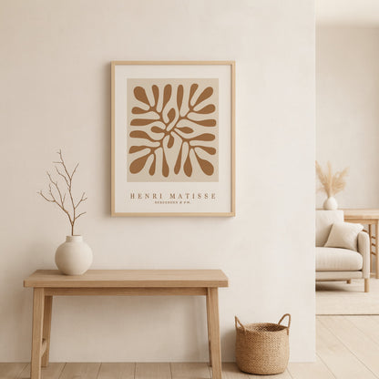 Nordic interior design with a wooden bench, vase, and henri matisse framed art​.