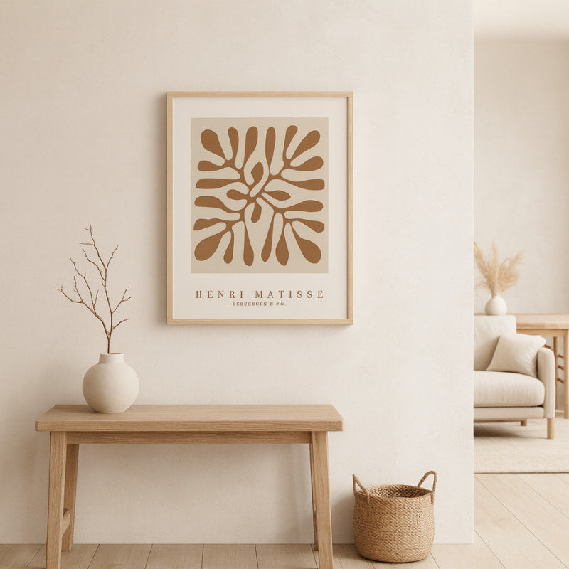 Nordic interior design with a wooden bench, vase, and henri matisse framed art​.