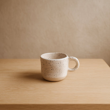 japanese tea cup ceramic on a table in a wabi sabi room.