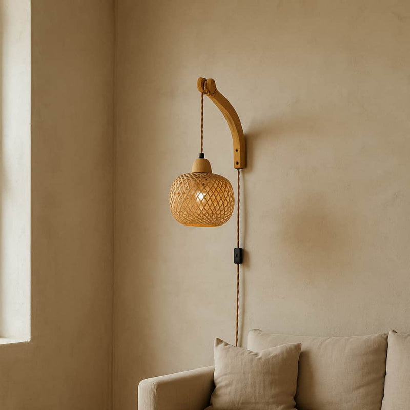 japanese wabi sabi lamp on a beige wall with a sofa in the corner