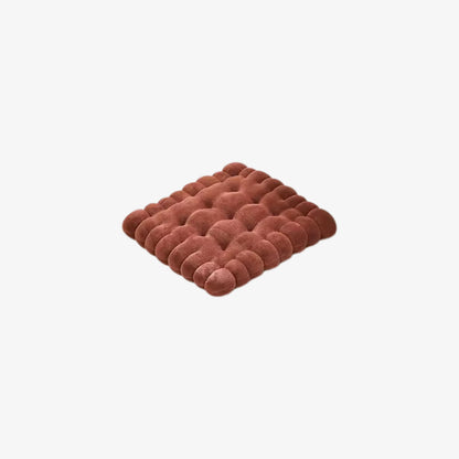 large brown floor cushions​ on a white background