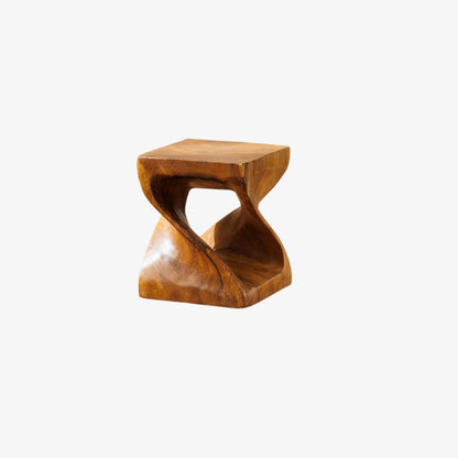 Wooden low counter stools with a unique design on a white background