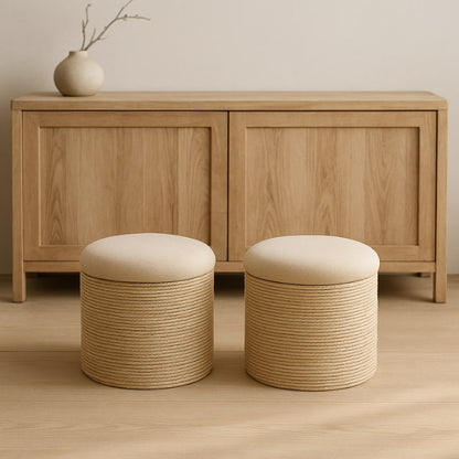 Two low step stool​ with beige cushions in a minimalistic room.