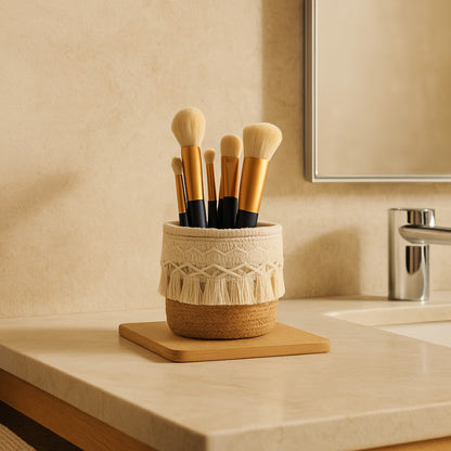 Makeup brushes in a make up basket​ on a bathroom counter