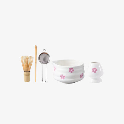 matcha bowl whisk set​ and other tools on a white background