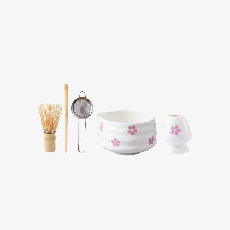matcha bowl whisk set​ and other tools on a white background