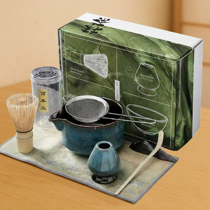matcha set blue with a green box on a wooden surface