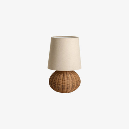 minimalist japandi floor lamp​ on a wooden table in a living room setting