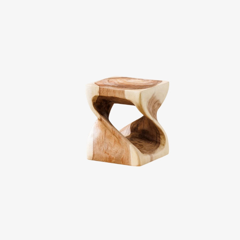 modern low stool​ with a wavy design on a white background
