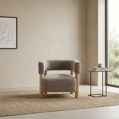 modern minimalist accent armchair with a side table and abstract art.