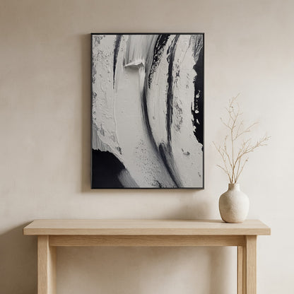 Abstract modern zen wall art​
painting on a beige wall above a wooden console table with a vase.