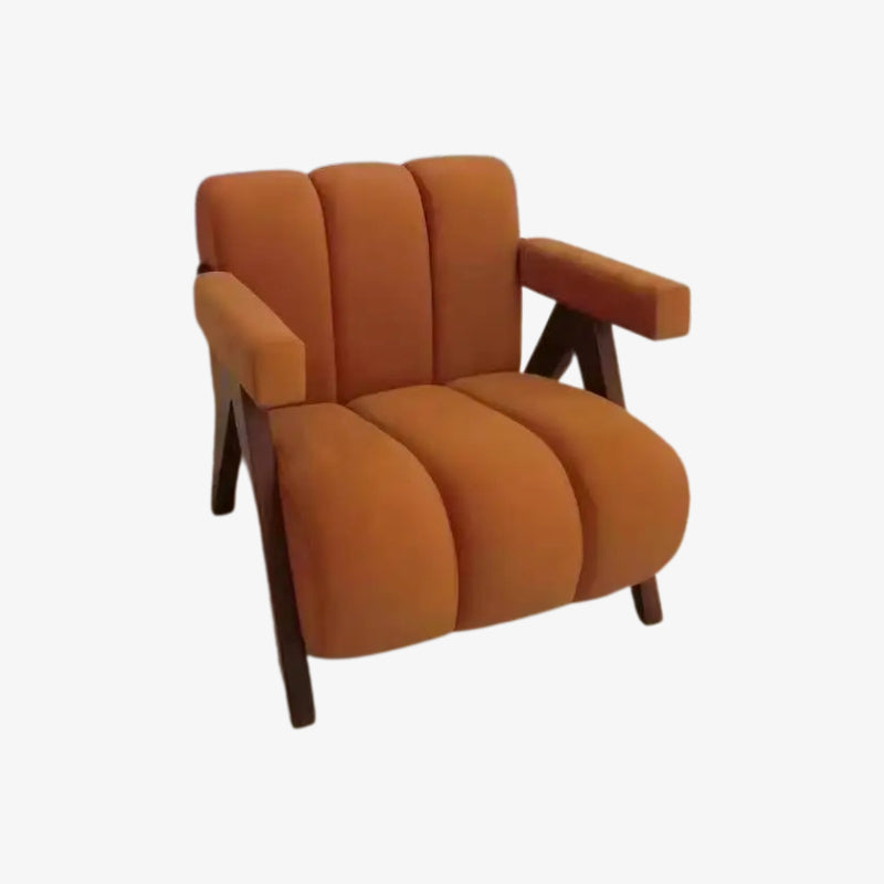 Orange velvet armchair on a white background