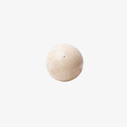 rounded white marble decorative stone on a white background
