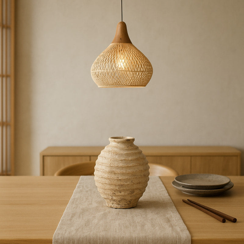 Textured rustic vase on a wooden surface with a soft background