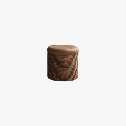 small foot pouf in a wabi sabi living room.