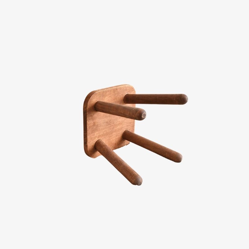 small wood stool​ with wooden legs on a white background