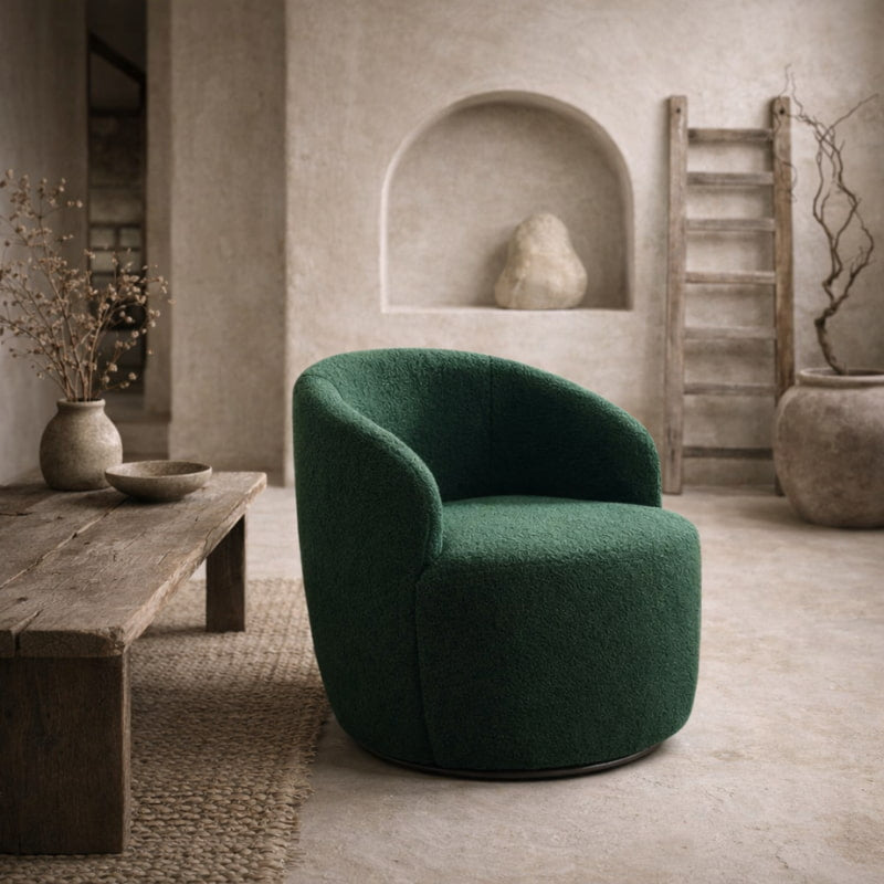Green swivel boucle chair in a room with wooden furniture and neutral decor