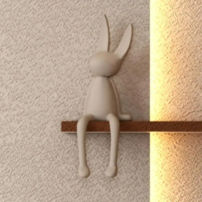 the contemporary home rabbit decoration​ with a light source casting a shadow.