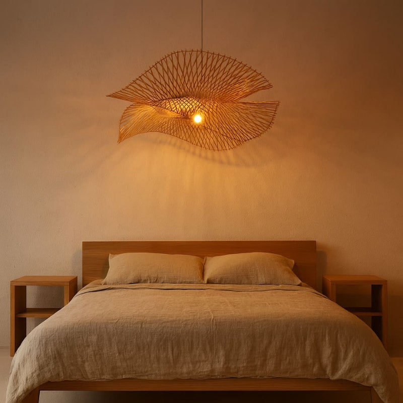 Bedroom with a wooden bed, bedside tables, and a unique ceiling light fixture.