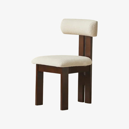 nique modern chair​ with white cushioned seat and backrest on a white background
