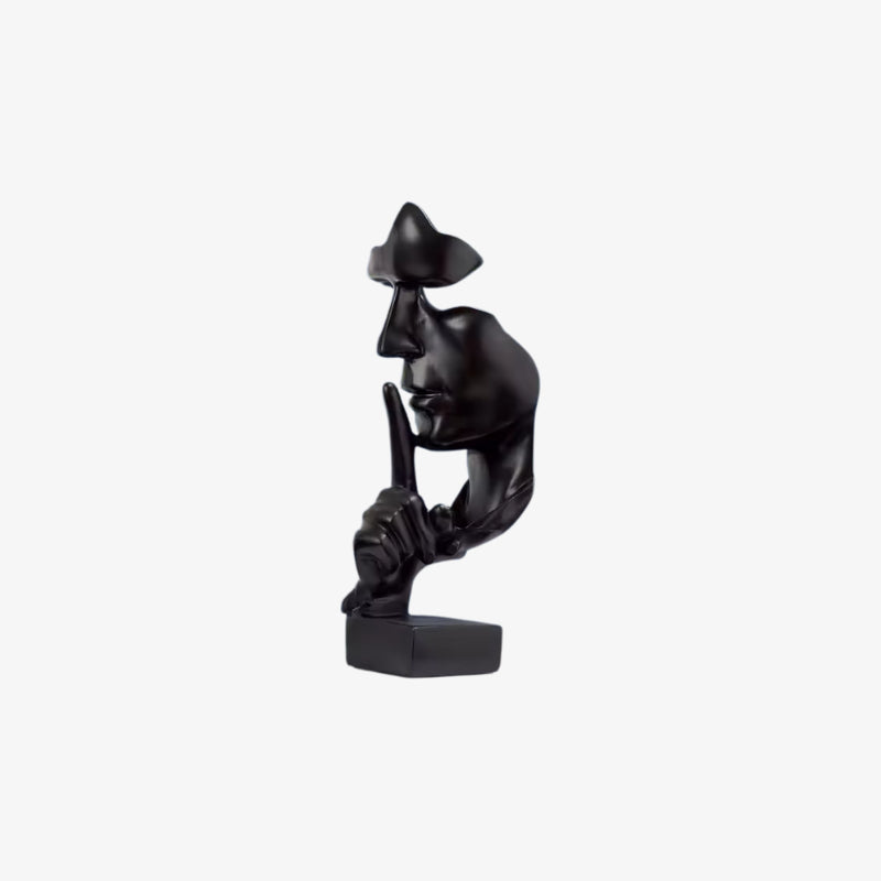 Black visage face​ sculpture of a person on a white background