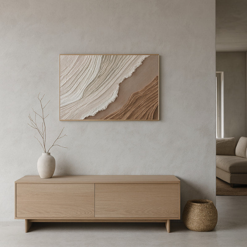 Wabi-sabi apartment decor​ with wooden cabinet, vase, and abstract wall art.