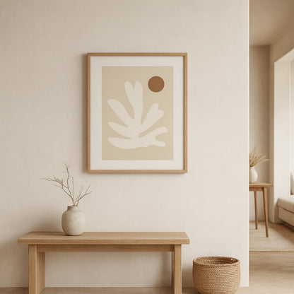Beige wabi sabi art studio​ on a wall with a wooden bench and decorative items in a minimalistic room.
