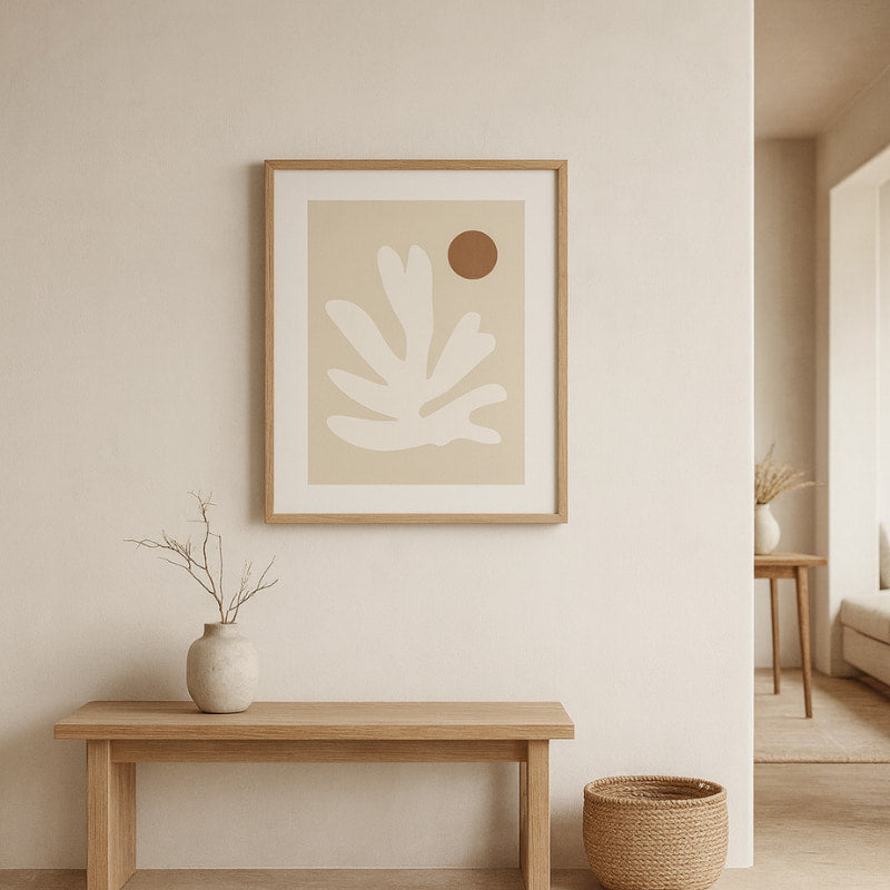 Beige wabi sabi art studio​ on a wall with a wooden bench and decorative items in a minimalistic room.