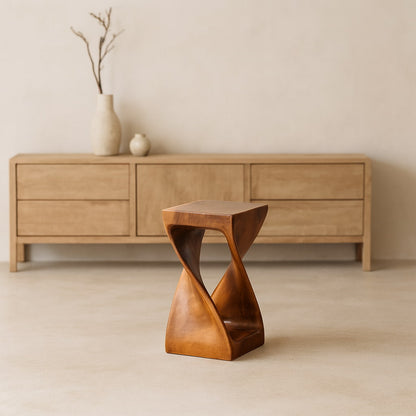 wabi sabi bar stools in front of a kitchen counter with a sink.