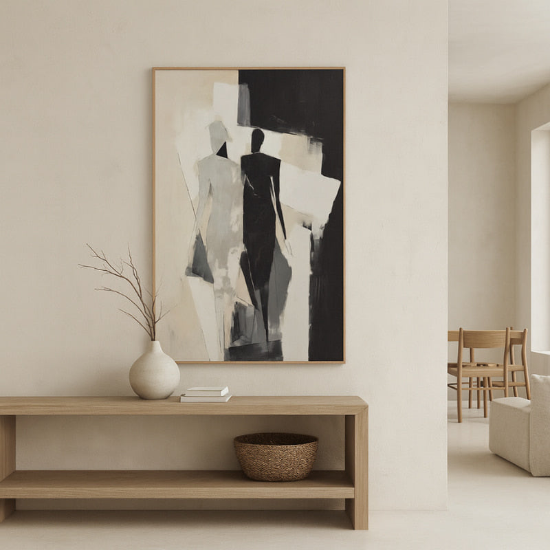 Wabi sabi home decor solution​ above a wooden console table in a living room.