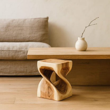 wabi sabi small stool​ in a living room setting.
