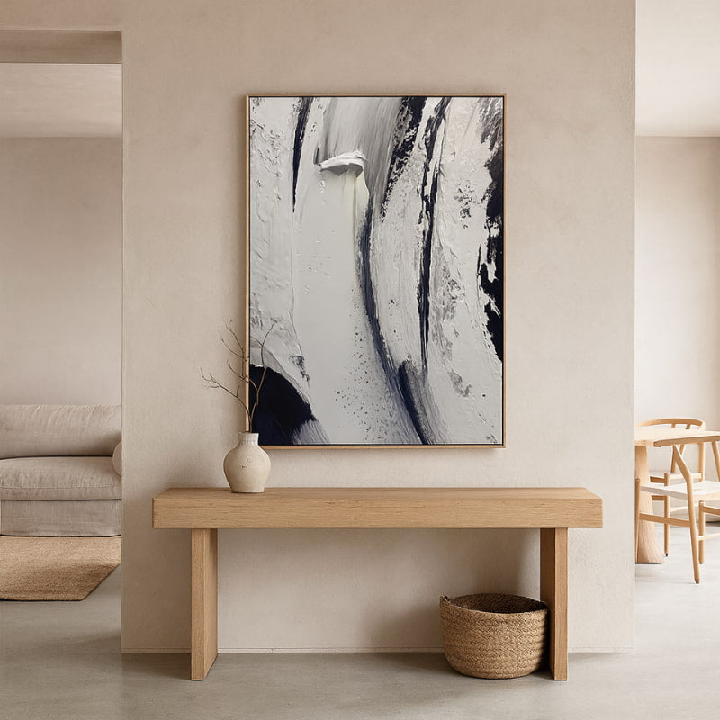Wabi sabi the art of imperfection​ with abstract art above a wooden bench