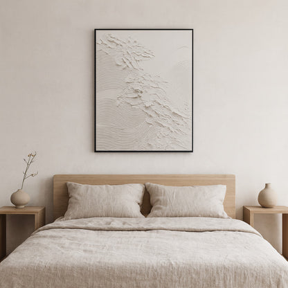 Beige bedroom with a bed, nightstands, and wall art zen​.