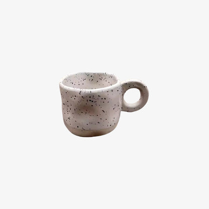 white ceramic coffee cup​ on a white background
